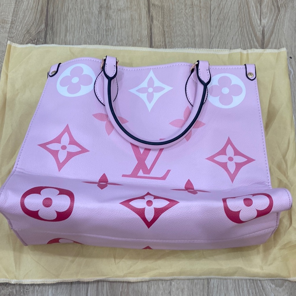 Never been used pink L V tote bag